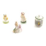 A Royal Doulton Beatrix Potter figure, Primrose Woodmouse, 9cm high, two others and an Adams preserv
