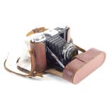 A Carl Zeiss Ikon Camera, with Nebro 32 Novar-Anastigmat 1.4.5 lens, 9cm high. (cased)