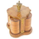 A 19thC French kingwood perfume box, with articulated sections revealing gilt highlighted glass bott