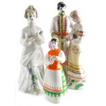 Various Ukrainian porcelain figures to included courting couple, polychrome decorated in green and p