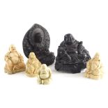 A resin figure of Buddha, seated with smiling expression, 18cm high, an Indian God and four various