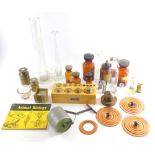 Various pharmaceutical bottles, brass weights, coloured glass and other pharmaceutical bottles, 18cm