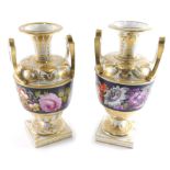 A pair of 19thC Derby porcelain vases, with raised handles, gilded floral stencilling, and bands of
