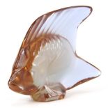 A 20thC Lalique purple glass figure of a fish, signed, 6cm high.