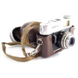 A 20thC Voigtlander Vitoret - F Camera, with Lanthar 2.8/50 lens, 12cm high. (cased)