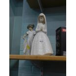 Two Nao porcelain figures.