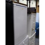 A Beko white coloured three drawer small freezer.