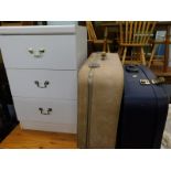 Cases, three drawer chest, and a pine side table.