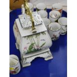 A Franklin Mint Oriental porcelain teapot and cups, each decorated with birds, flowers, etc.