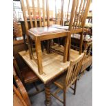 An oak draw leaf table, with spirally turned supports, various oak dining chairs, work table and a