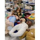 Two Capodimonte type figures, various dolls, plush jointed Teddy bear, etc.