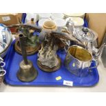 A three piece silver plated tea set, brass bell, etc.