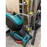 A quantity of garden tools, to include a Bosch electric lawn mower, a Ryobi electric strimmer, hedge