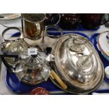 A quantity of silver plated ware, to include a bottle or cruet stand, tureens, etc.