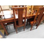 A Jig style hardwood dining table and six chairs.