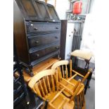 A collection of furniture, to include a dark stained oak bureau, pine sideboard, four chairs,