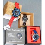 Four gentlemans wristwatches, comprising a Zennox spy camera watch, a Smael sports watch, an Earth w