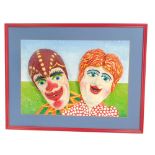 A papier mache raised plaque of Punch & Judy charactures, in colours signed with love from Punch & J