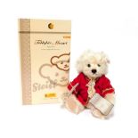 A Steiff Mozart teddy bear, ivory, 28cm high, limited edition, boxed.