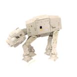 A Star Wars AT-AT model, probably The Empire Strikes Back, in unassociated box.