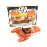 A Star Wars Kenner Land Speeder, 1977 copyright. (boxed)
