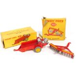 A Dinky Toys Massey Harris manure spreader, and a disc harrow. (2, boxed)