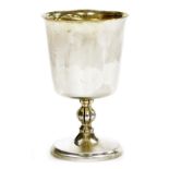 An Elizabeth II silver goblet, the bowl of plain form, with a bulbous line decorated stem, on circul