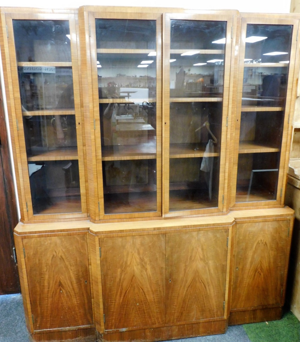 An Art Deco walnut breakfront bookcase, the top with four glazed doors, each enclosing three shelves - Image 2 of 2