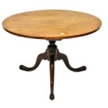 A George III mahogany occasional table, cut down, the circular top raised on a vase shaped column ab