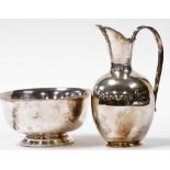 A 20thC Continental white metal ewer, stamped 835, 32cm high, 15oz, together with a B. Altman bowl,