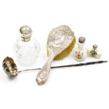 A group of silver, a silver topped cut glass scent bottle, of globular form, the lid monogrammed, Bi