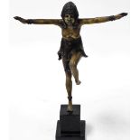 Manner Dimitri Chiparus. A bronzed metal figure of an Egyptian dancer, raised on a faux marble base,