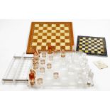 A contemporary cut glass chess set, with board, marble chess board, and a Jaques of London wooden ch