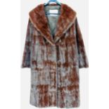 A fox full length fur coat, by L Marks, Furrier of Wolverhampton.