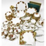 A Royal Albert porcelain dinner and tea service, decorated in the Old Country Roses pattern, few sec