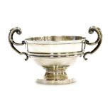 A George V silver two handled cup, with scroll handles, the body with raised banding, Sheffield 1910