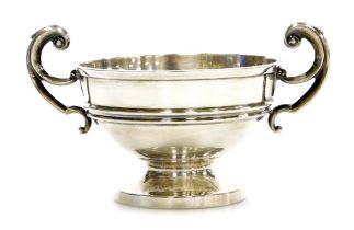 A George V silver two handled cup, with scroll handles, the body with raised banding, Sheffield 1910