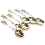 A set of six Victorian silver Fiddle pattern dessert spoons, each with engraved C initial to handle,