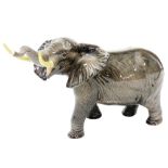 A Beswick pottery figure of a bull elephant, printed marks. (AF)