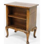 An early 20thC walnut oak and herringbone inlaid double sided bookcase, each of two shelves, raised