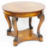 An Empire style mahogany burr walnut and marquetry inlaid drum library table, the circular top with