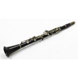 A Boosey & Hawkes Regent clarinet, number 51689, 67cm wide.