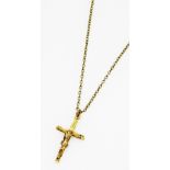 A 9ct gold crucifix pendant, on a silver gilt belcher link neck chain, on a bolt ring clasp, 3.7g al
