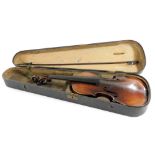 A violin, with a two piece back, with bow, coffin cased.