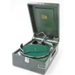 An HMV tabletop green cased gramophone, 59cm wide, 52cm deep.