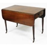 A Victorian mahogany Pembroke table, with single frieze drawer, raised on turned legs, brass capped