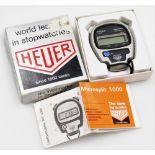A Heuer Microsplit 1000 digital display stopwatch, with box and instructions.