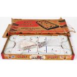 A 1950s Eagle tabletop pro hockey game, with original box, approximately 87cm wide.