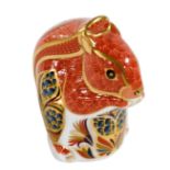 A Royal Crown Derby Imari porcelain paperweight, modelled as a red squirrel, printed marks, gold sto