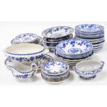 A late 19thC Minton pottery part dinner service, decorated blue and white in the Delft pattern, comp
